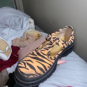 Urban outfits platform tiger print shoes.